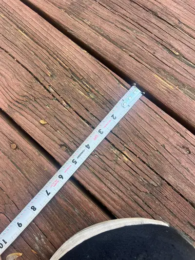 Measuring the gap between weathered deck boards